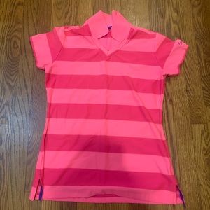 Look cute on the golf course with this Nike tour performance pink shirt.